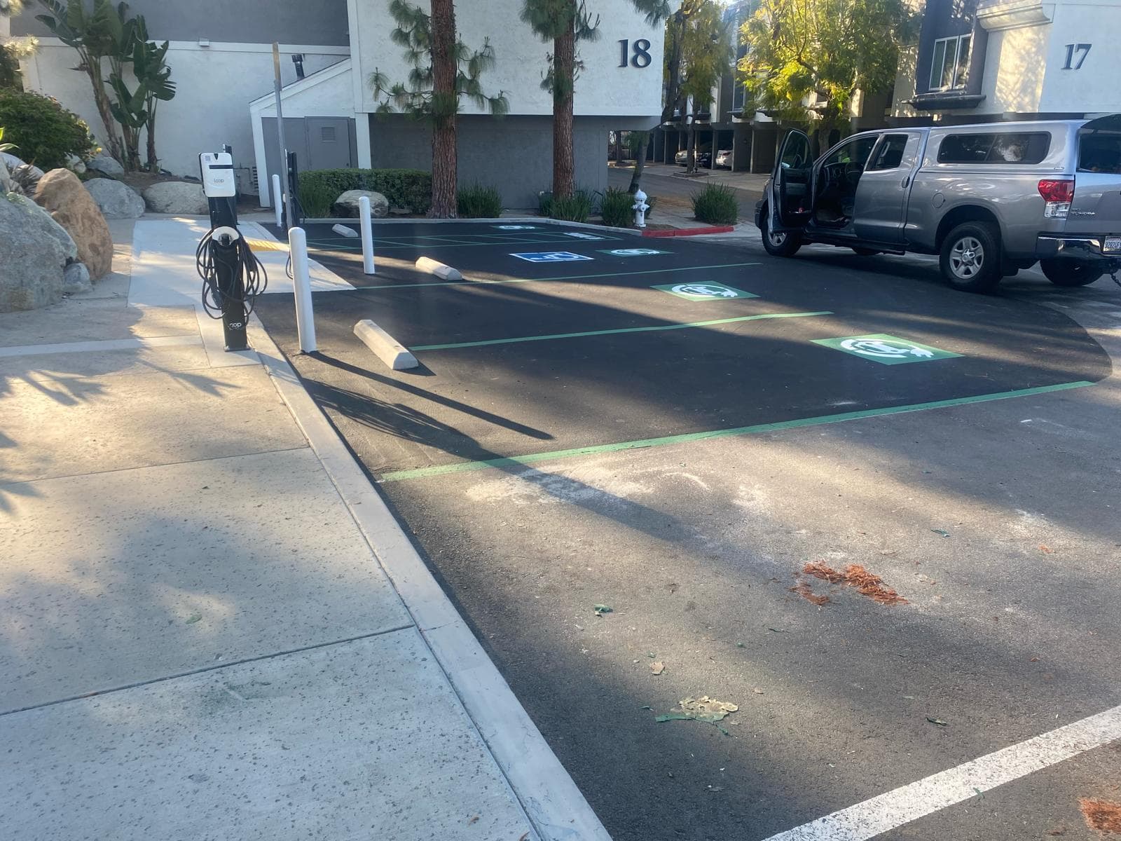 Picture of newly laid asphalt in a commercial parking lot
